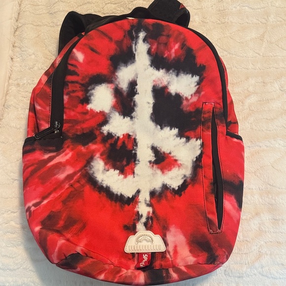 Sprayground Other - Sprayground Red and Black Tie-Dye Backpack with White Symbol